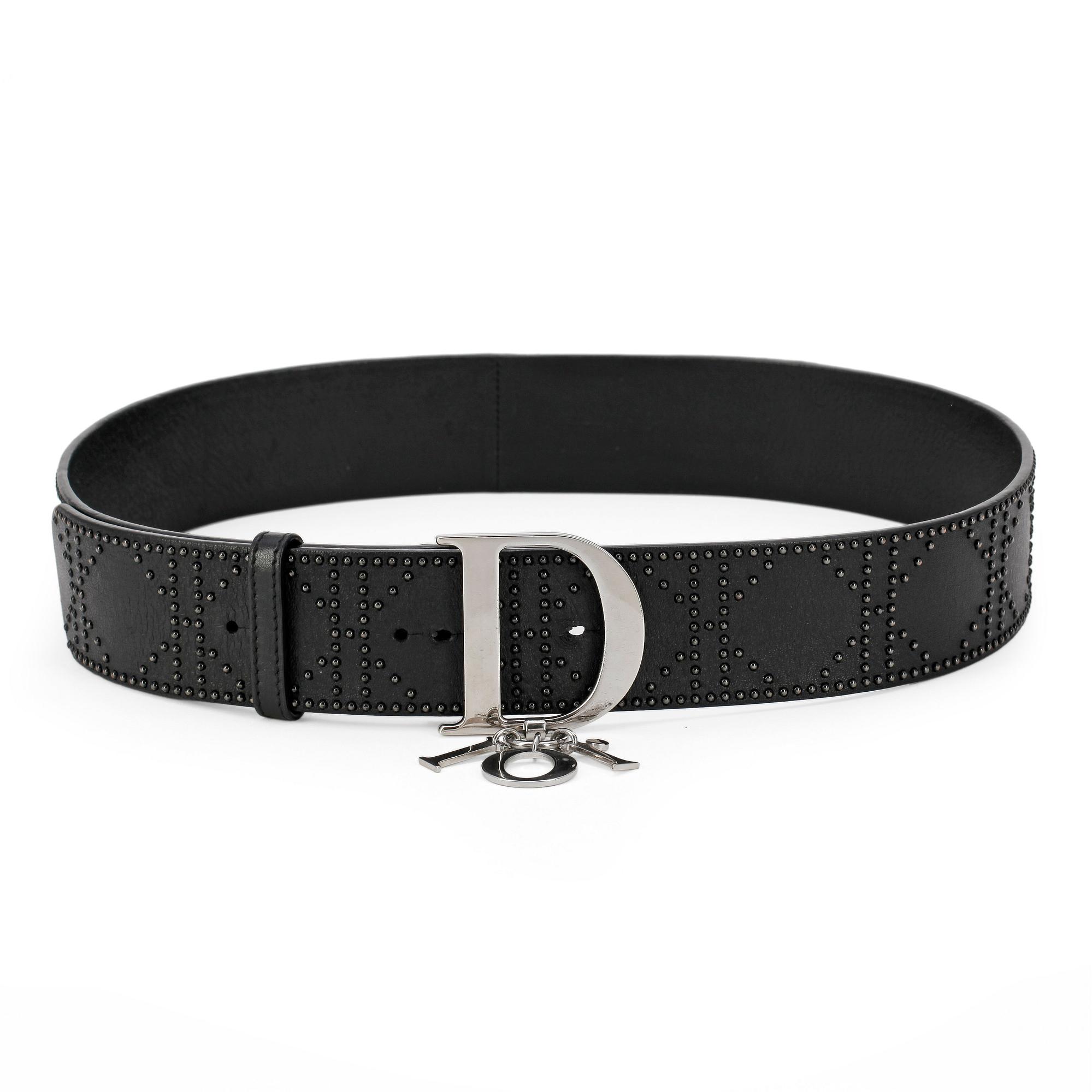 CHRISTIAN DIOR, a black leather belt.