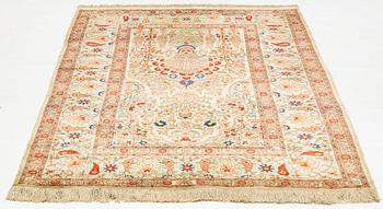 A rug, semi-antique, silke Hereke, ca 185 x 122 cm.