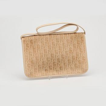 CHRISTIAN DIOR, a beige monogram canvas evening bag.