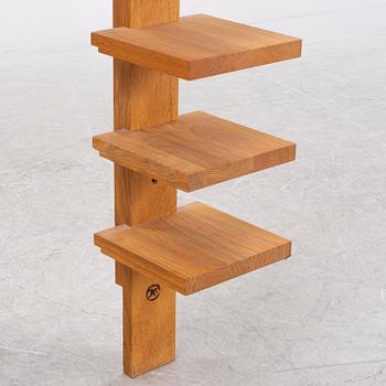 A 'Pilaster' shelf by John Kandell for Källemo, designed 1989.