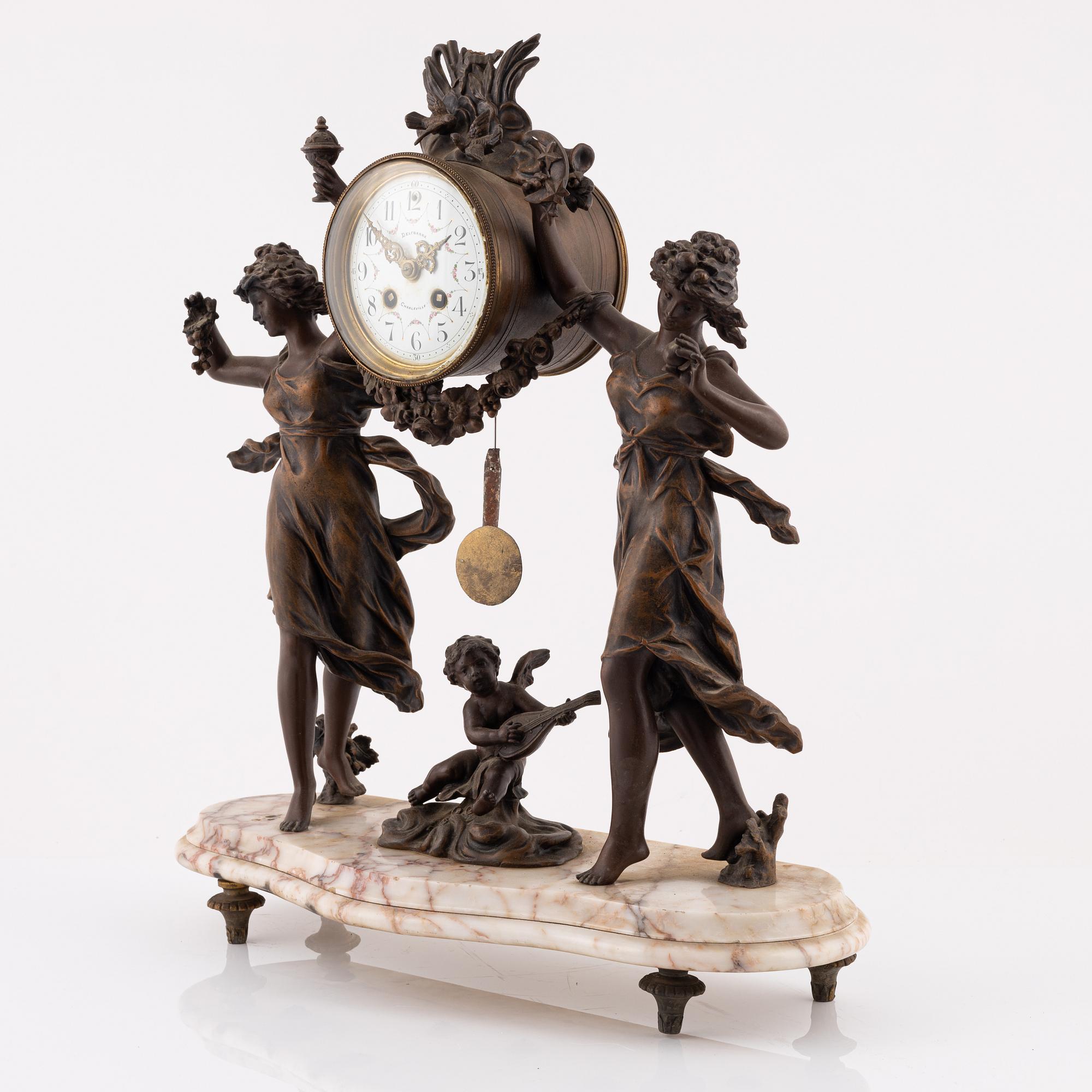 A Louis XVI style mantle clock, France, late 19th Century.
