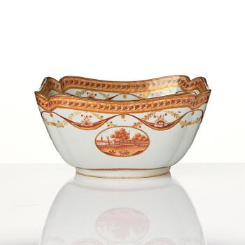 An oval vegetable tureen with cover and a pillow shaped bowl, Qing dynasty, late 18th century.