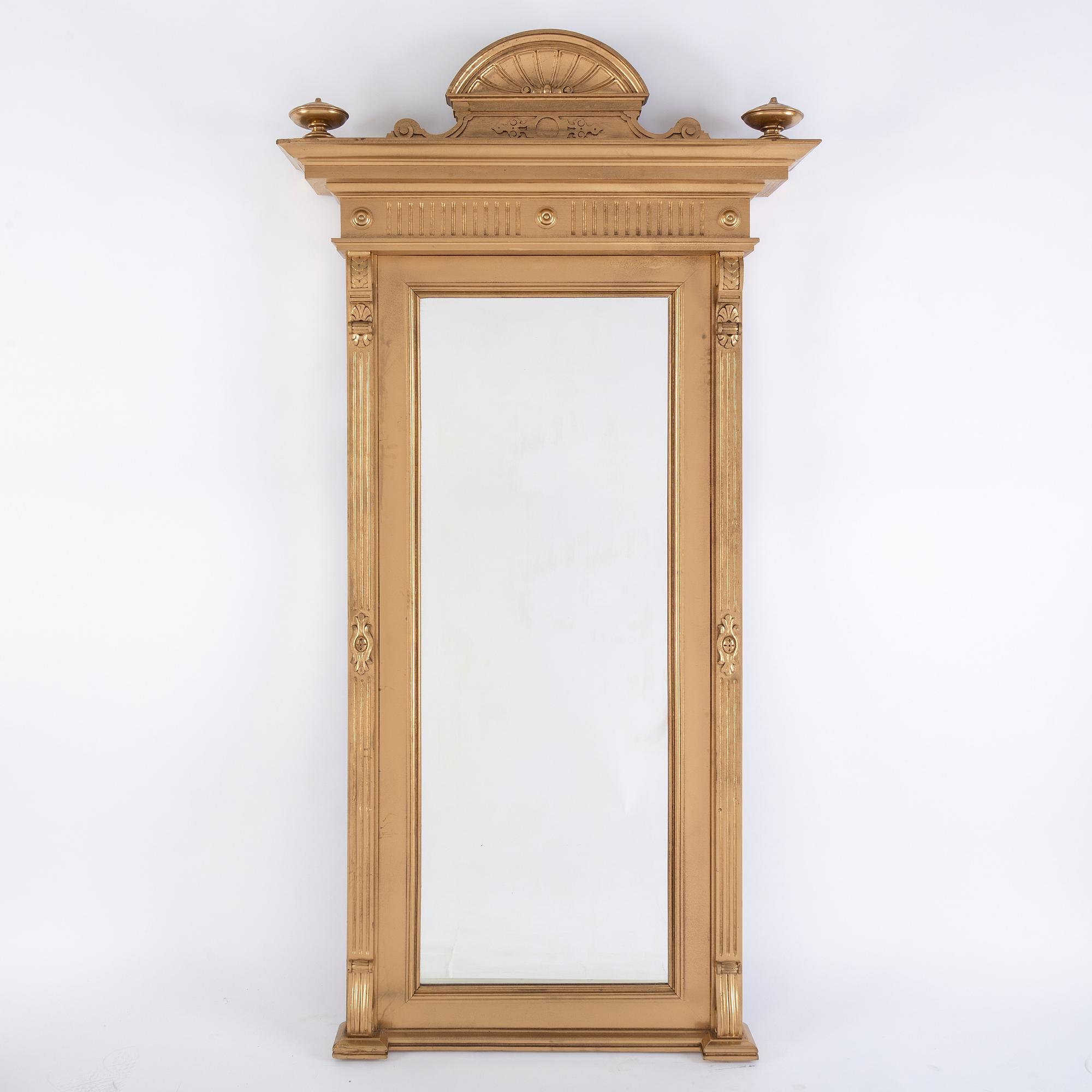 An end of the 19th Century rennaisance style bronzed mirror-.