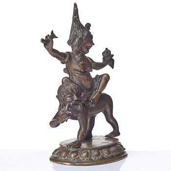 A Tibeto-Chinese bronze figure of a Rakshasi, ca 1900.