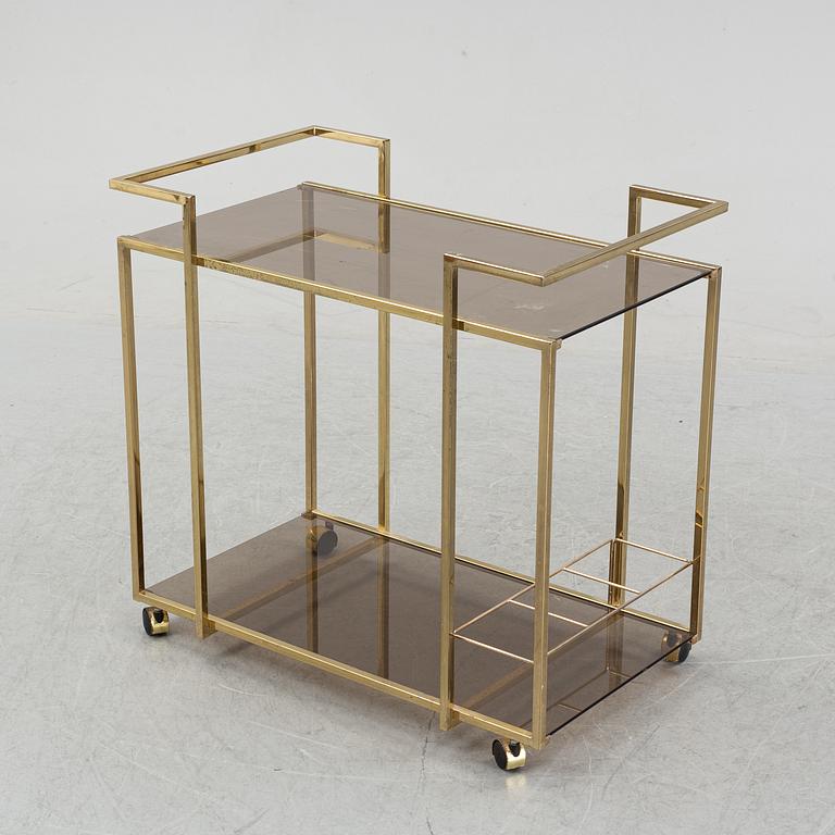 A brass and glass drink trolley, end of the 20th Century.