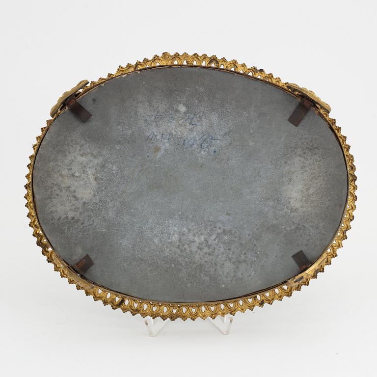 An late Empire gilt brass mirrored plateau, mid part of the 19th Century.