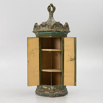 Corner cabinet, likely 18th century.