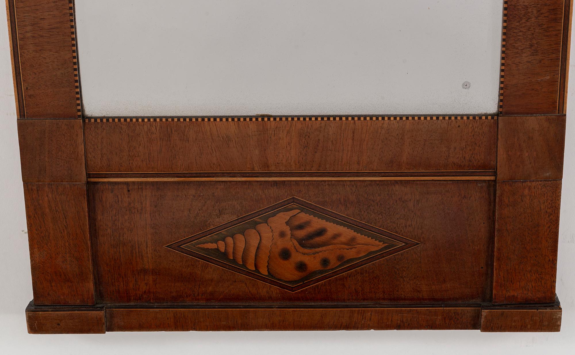 A first half of the 20th Century mahogany veneered mirror.