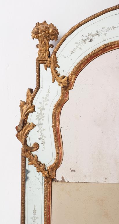 A Baroque gilt-lead and engraved glass mirror by Burchardt Precht (active in Stockholm 1674-1738).