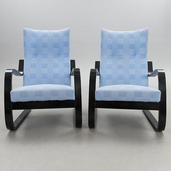 A pair of mid 20th century '36/401' armchairs for Artek, Finland.