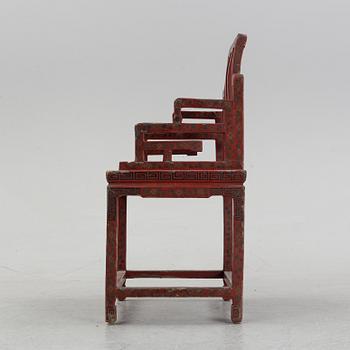 A chinese laqcuer armchair, 20th century.