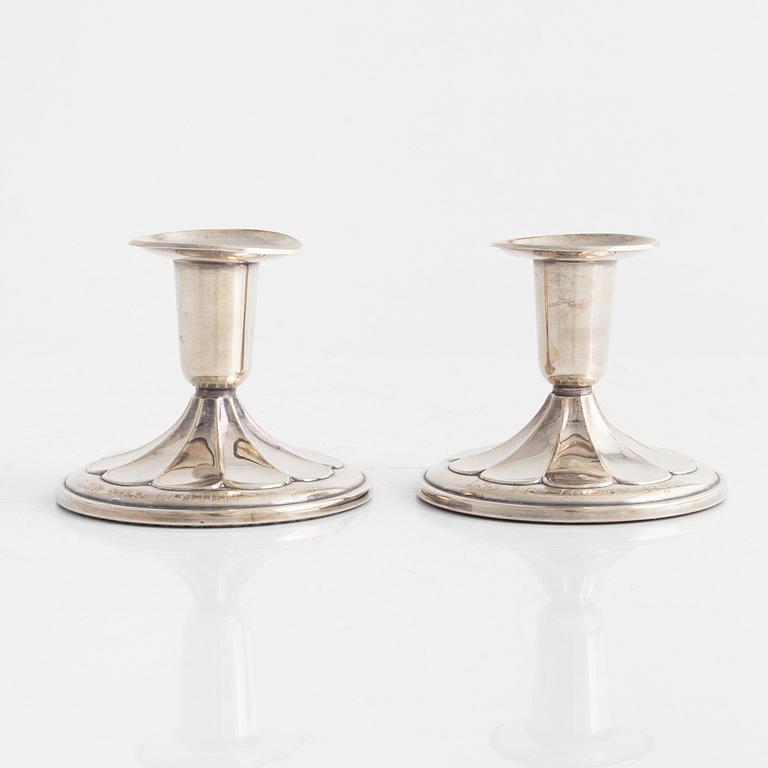 A pair of Swedish silver candlesticks, mark of K&EC, Gothenburg 1959.