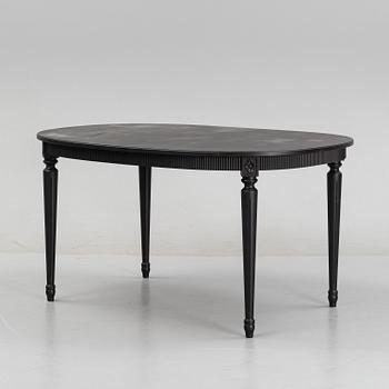 A Gustavians style dining table, second half of the 20th Century.