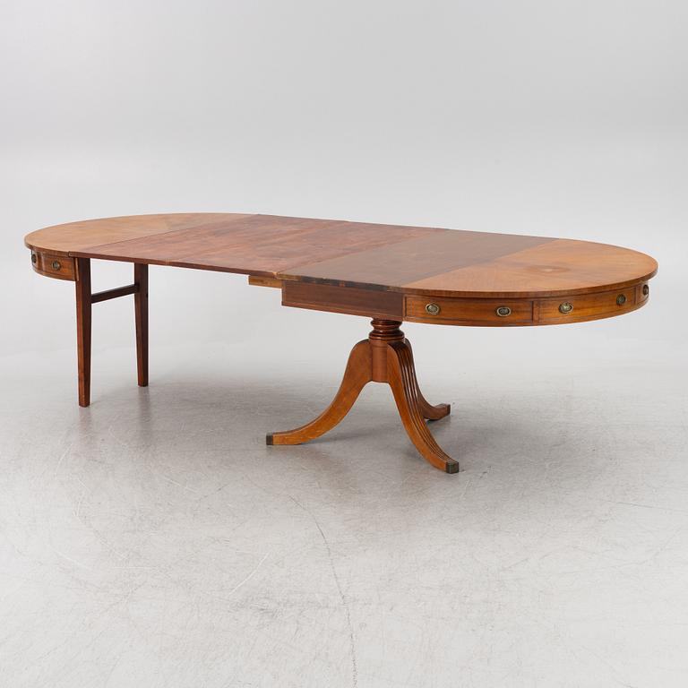 A George III style dining table, England, 20th century.