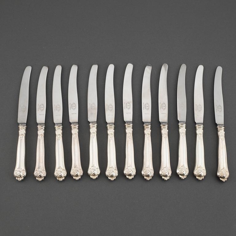 Twelve model 'Sachsisk' table knives, with Swedish import marks.