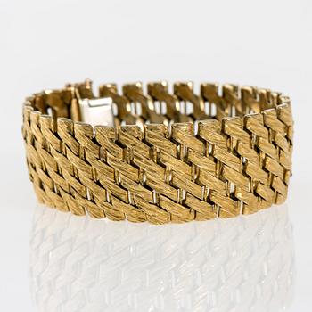 ARMBAND, 18K guld. Helsingfors 1965. Vikt ca 77,8 g.