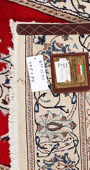 A runner carpet, Nain, part silk, 9 laa, c. 378 x 84 cm.