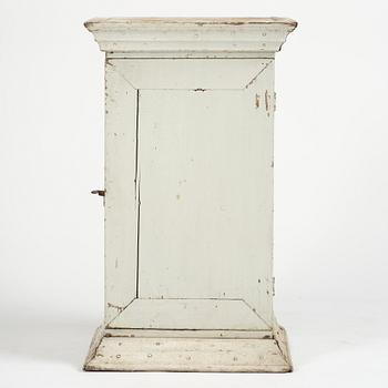 A Gustavian column-shaped cabinet, circa 1800.