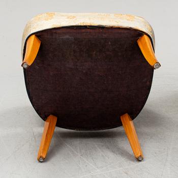 A pair of easy chairs 'Gamla Berlin' by Carl Malmsten.