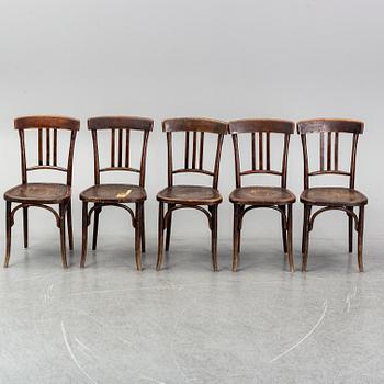 A matched set of four wooden chairs, first half of 20th Century.
