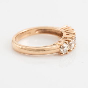 Brilliant cut diamond five stone ring.