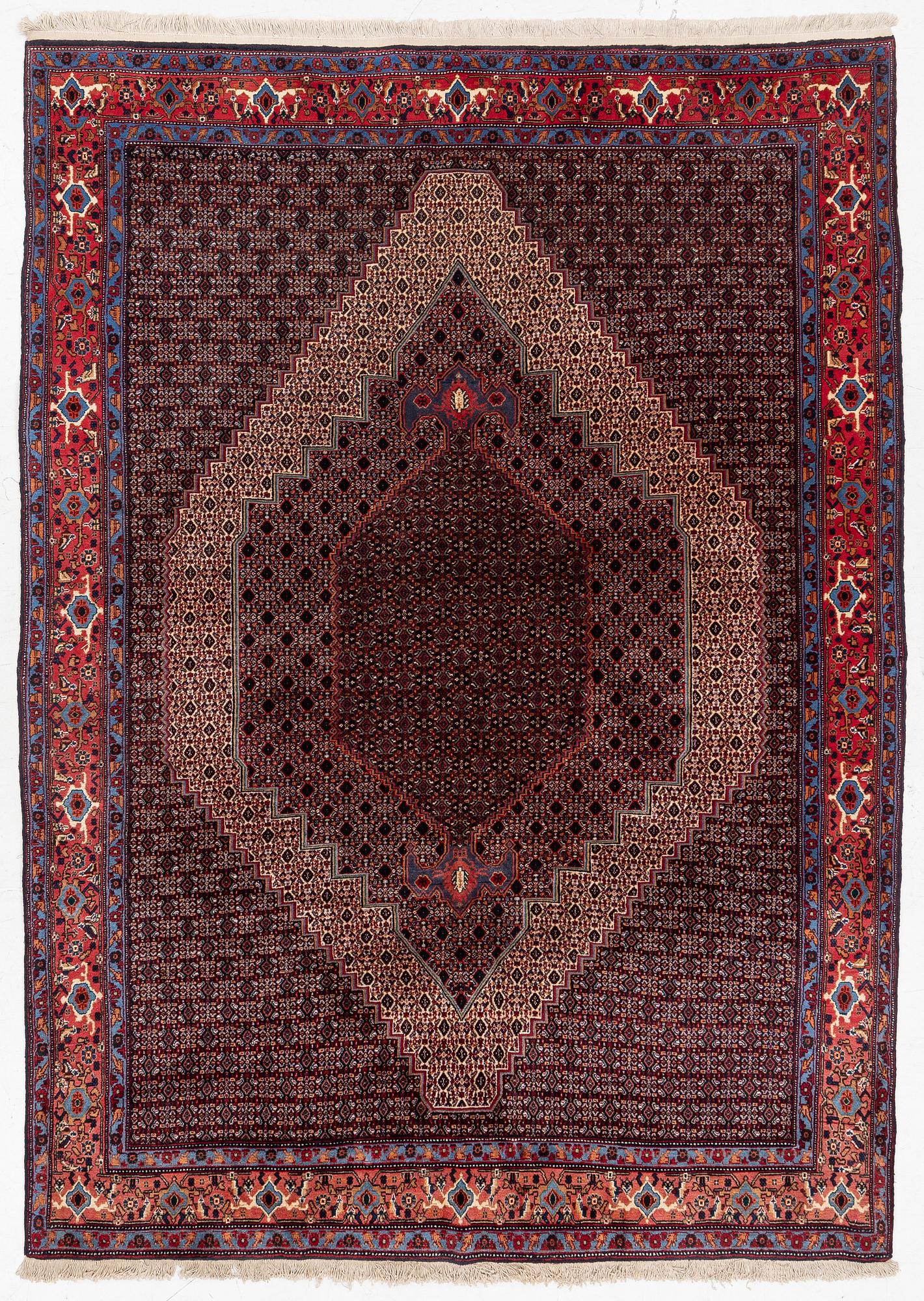 A Senneh carpet, c. 284 x 204 cm.