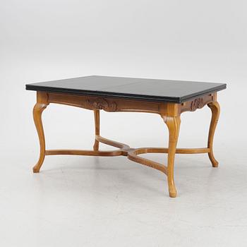 A Baroque style dining table , L.J. Larssons snickeriaffär, Mariefred, early 20th Century.