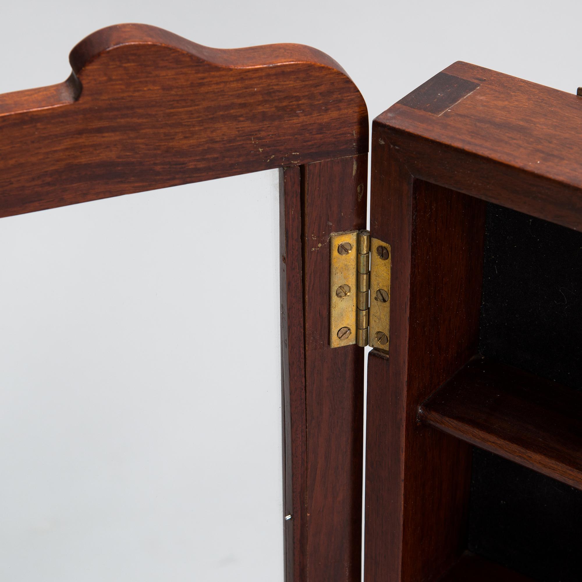 A Chinese 20th century hardwood wall cabinet.