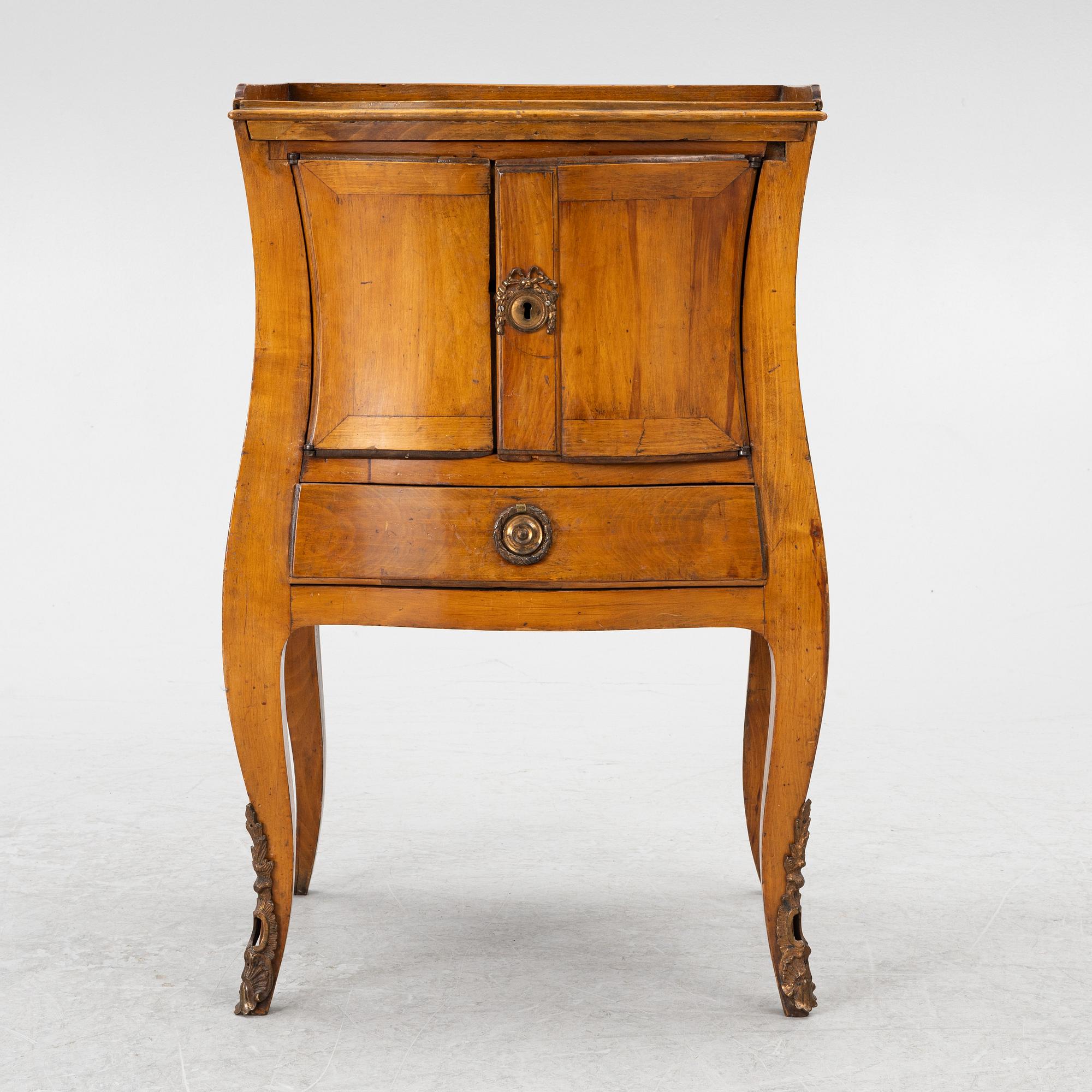 A Swedish rococo chamberpot cupboard, later part 18th century.