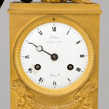 A French empire early 19th century mantel clock.