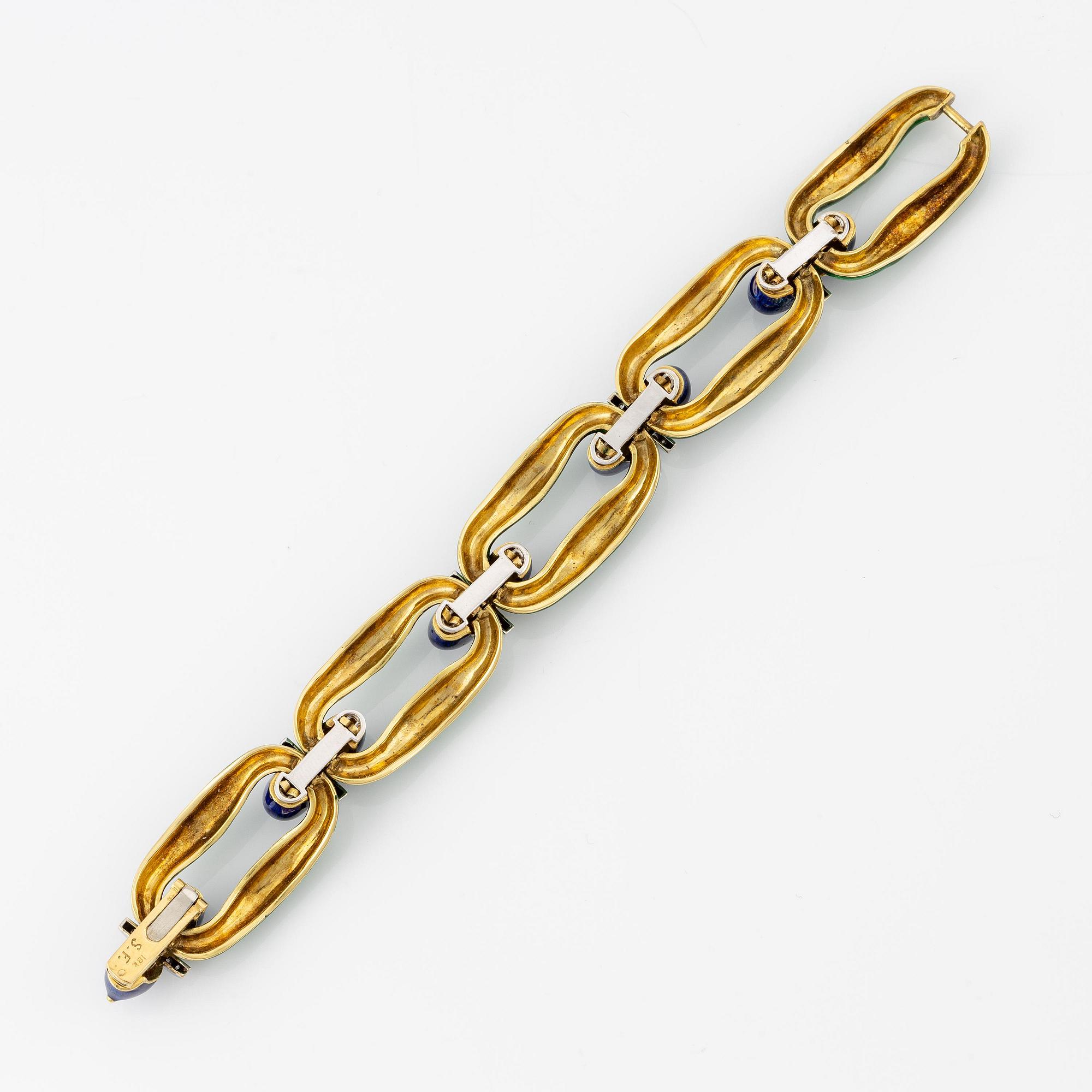 Armband 18 guld med emalj och runda briljantslipade diamanter, Spritzer & Fuhrmann.