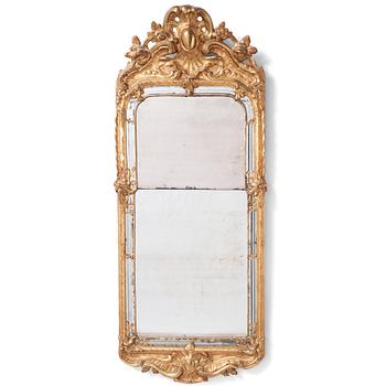 76. A Swedish Rococo mirror.