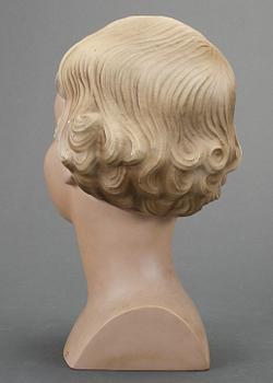 SKYLTDOCKA, huvud, 1900-talets första hälft.