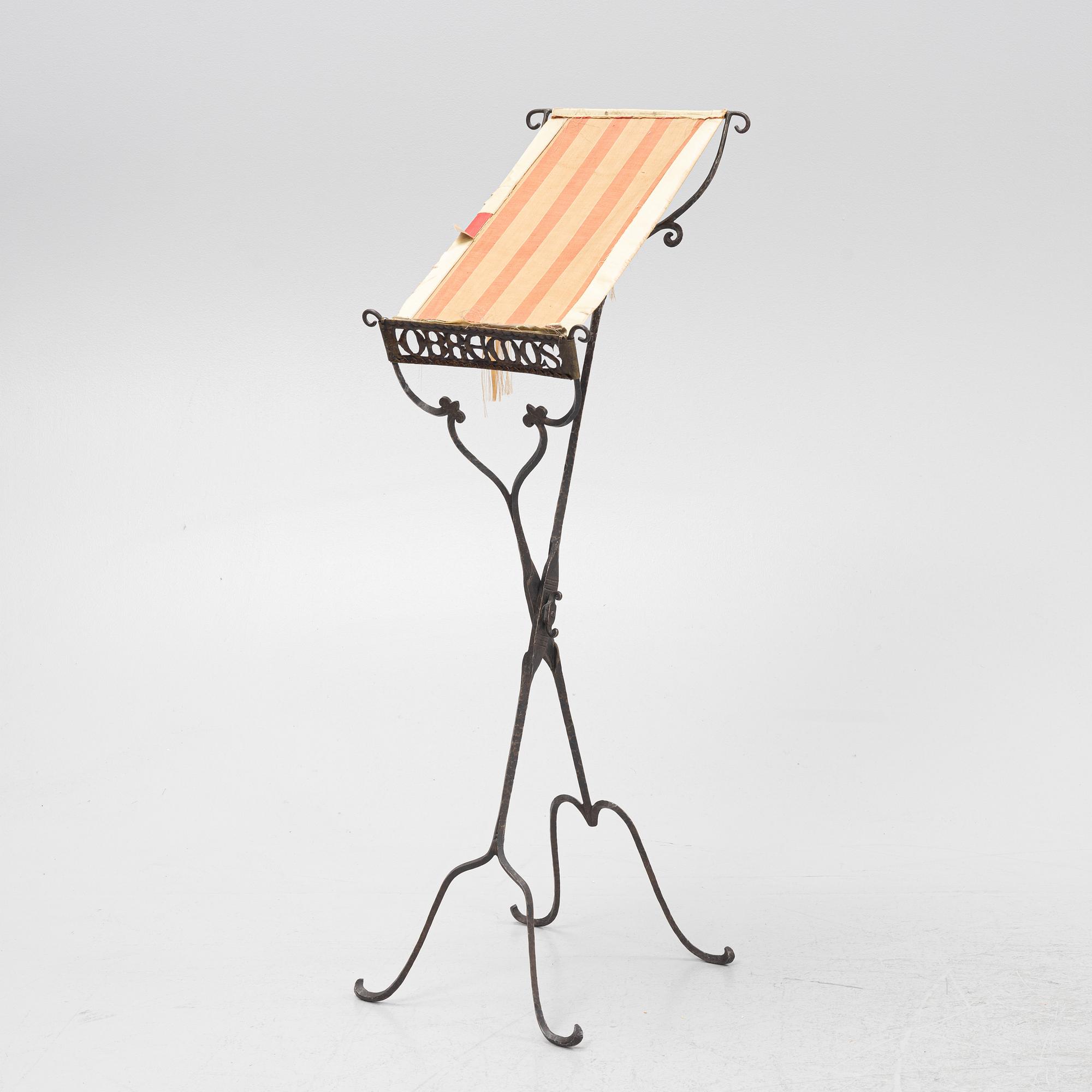 An iron book stand early 20th Century.