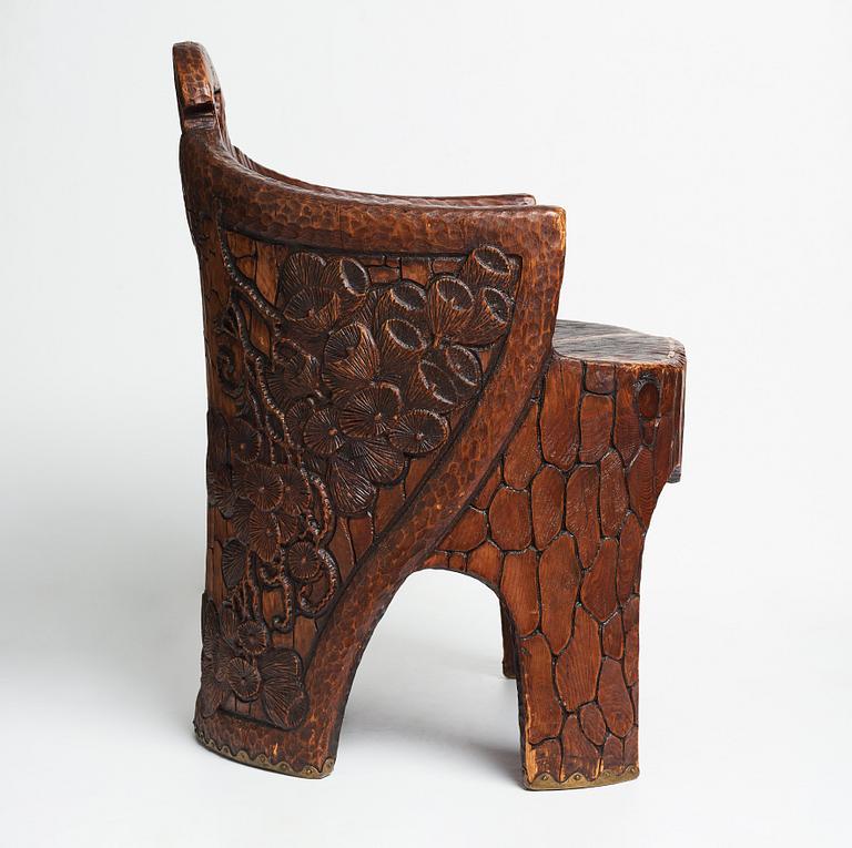 Gustaf Fjaestad, a pair of Art Nouveau carved pine chairs "stabbestolar", Arvika Sweden 1908-1909.