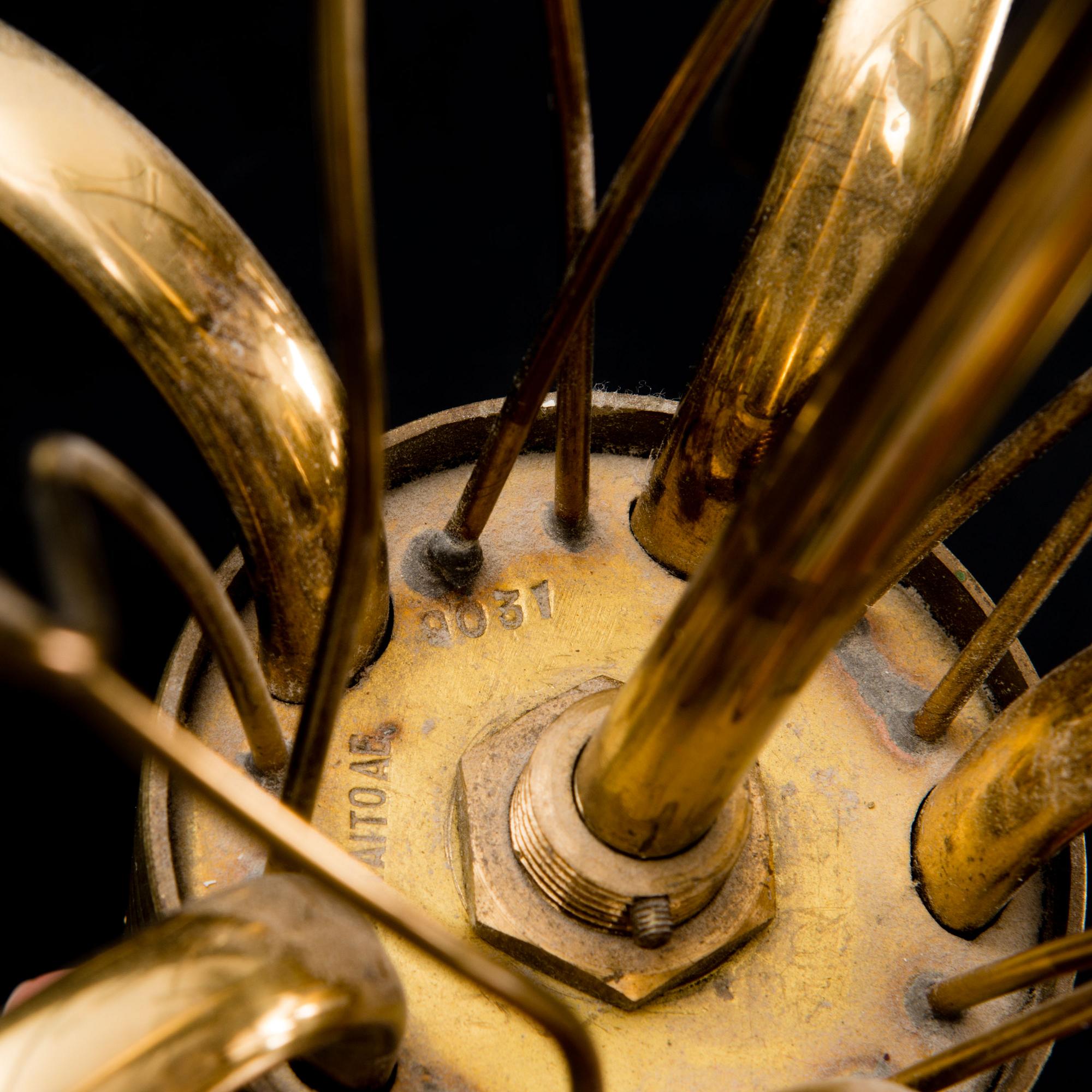 A mid-20th century pendant lamp model 9031 for Taito, Finland.