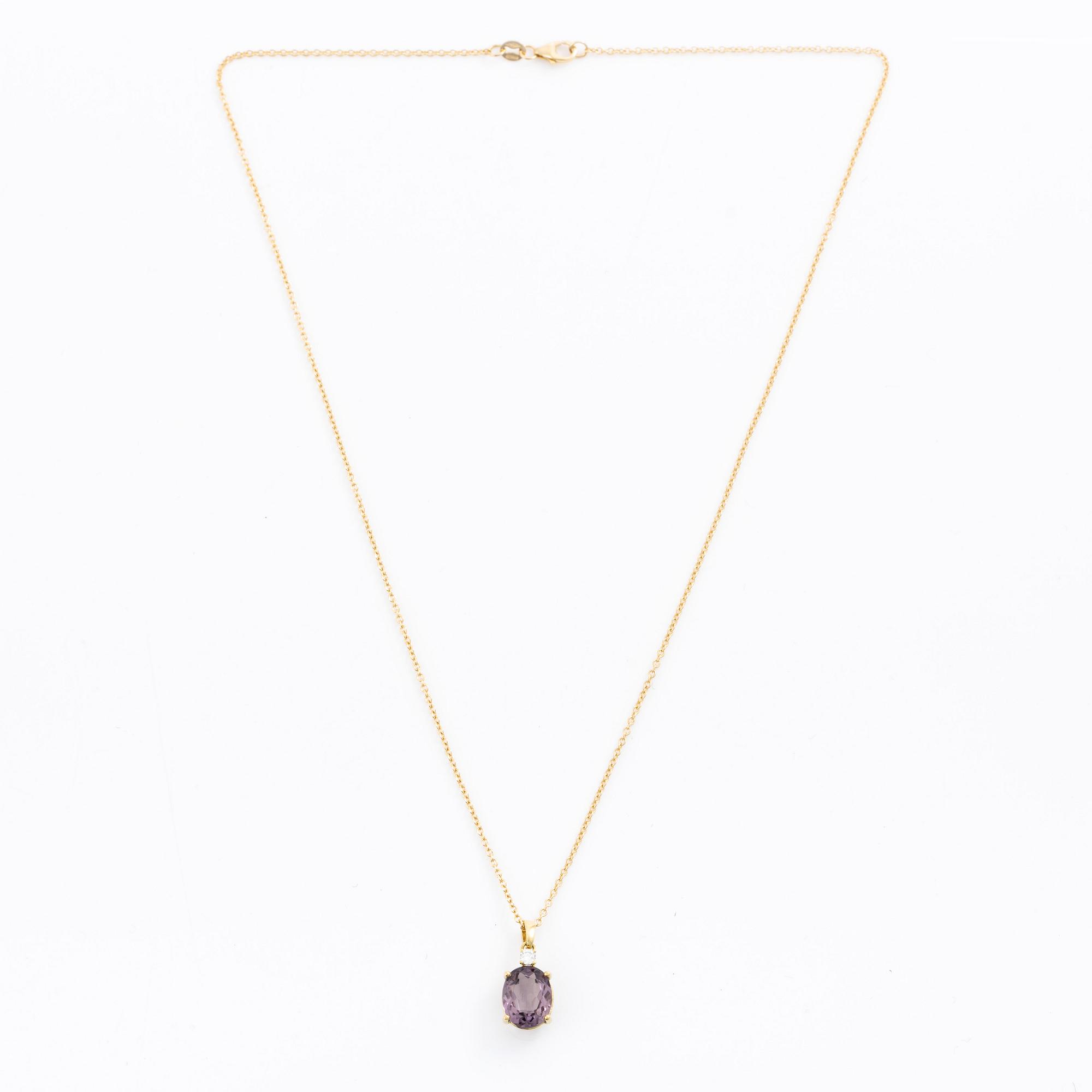 Necklace 18K gold with purple tourmaline and brilliant-cut diamond.