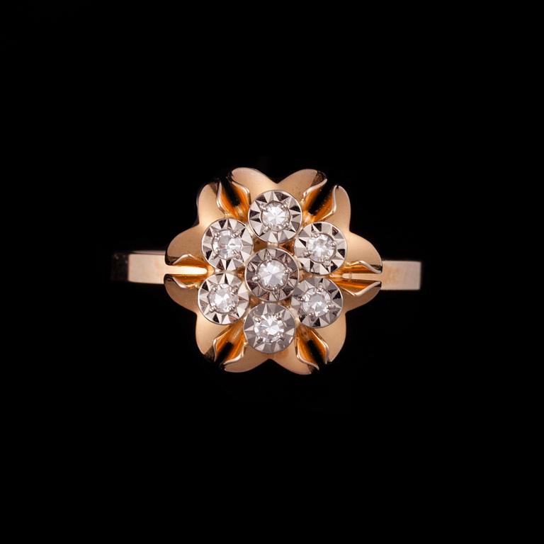 RING, 14K guld, 7 diamanter tot. ca 0,05 ct. Elis Kauppi Kupittaan Kulta 1983. Vikt 3 g.