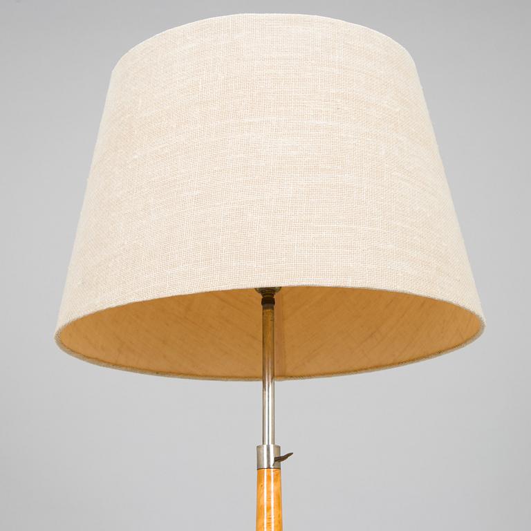A 1930s burl birch lamp table.