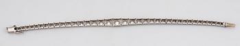 A platinum bracelet set with round brilliant-cut diamonds with a total weight of ca 3.75 cts.