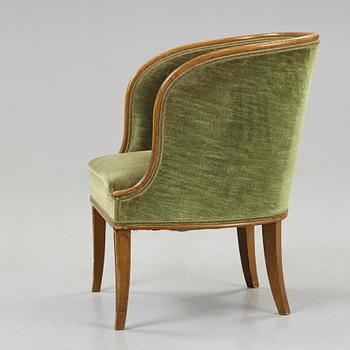 Axel Einar Hjorth, A 'Bellman' elm armchair, attributed to Axel Einar Hjorth, Nordiska Kompaniet, Sweden ca 1929.