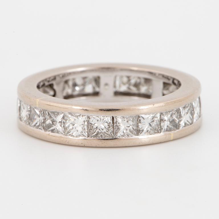 Princess-cut diamond eternity ring.
