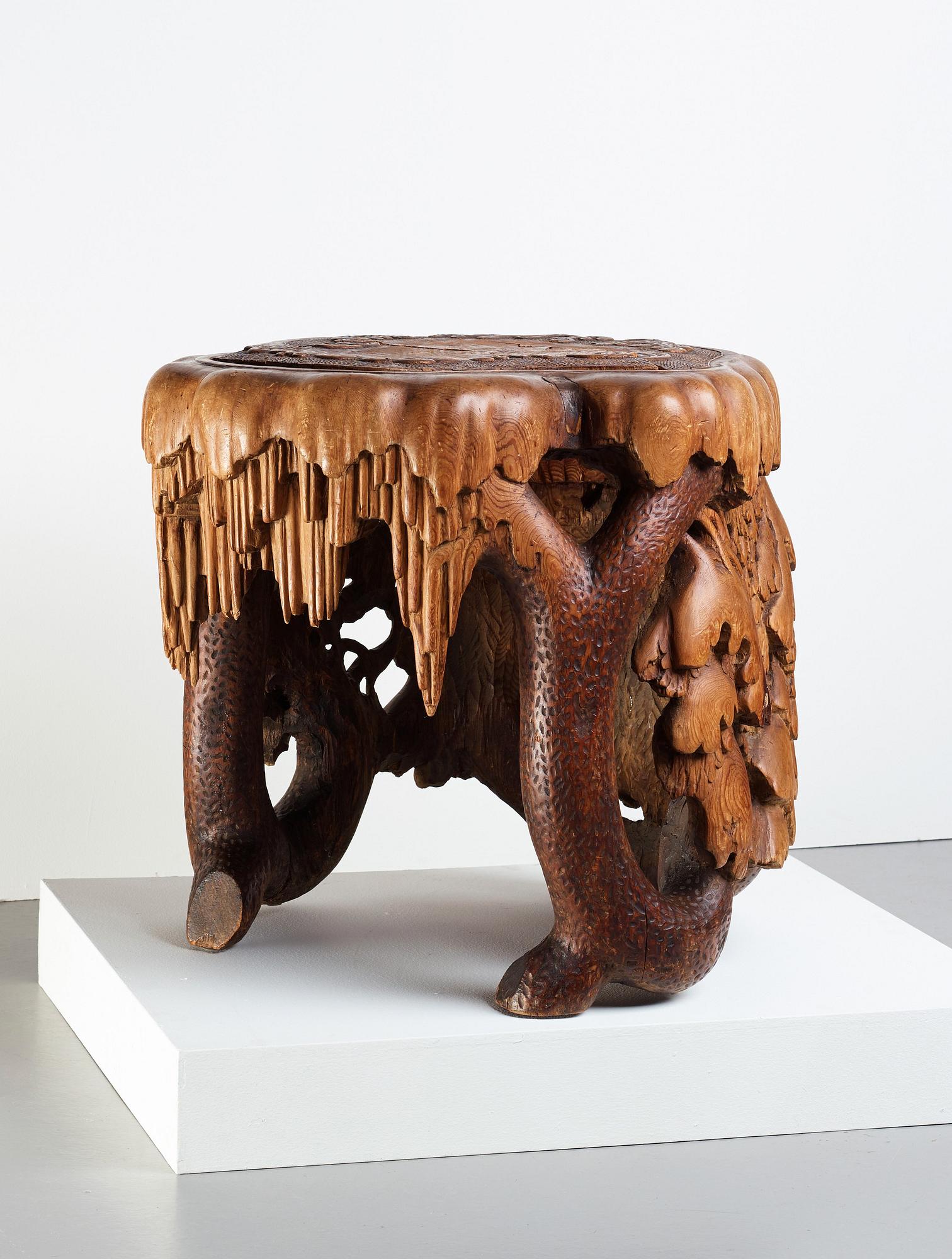 Knut Fjaestad, A Knut Fjaestad Art Nouveau sculptured pine table, Sweden ca 1900.