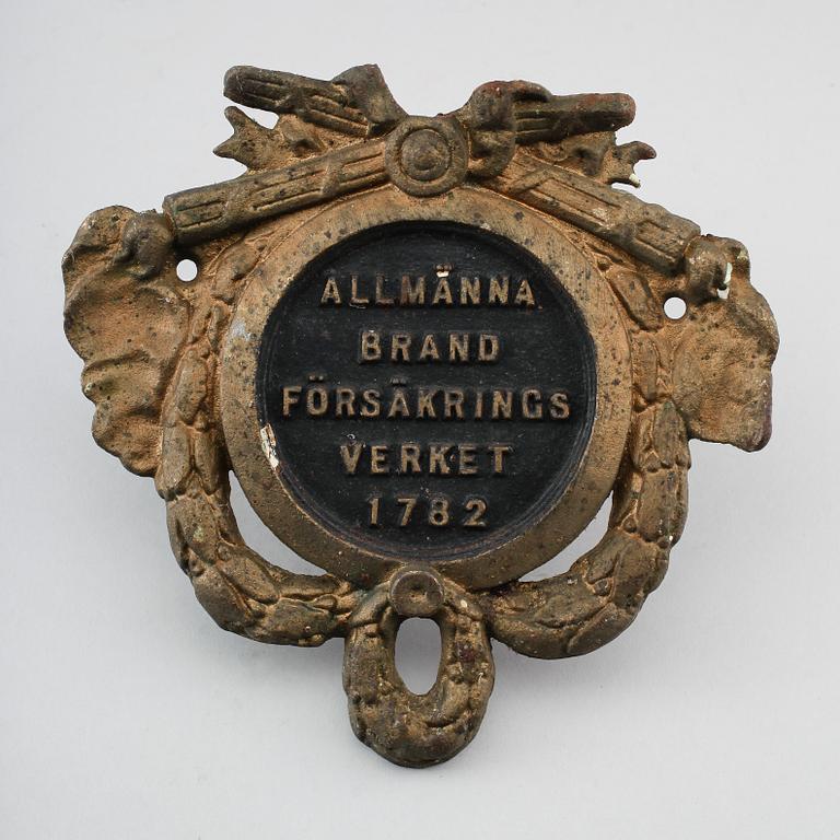 BRANDSKYLT, järn, daterad 1782.