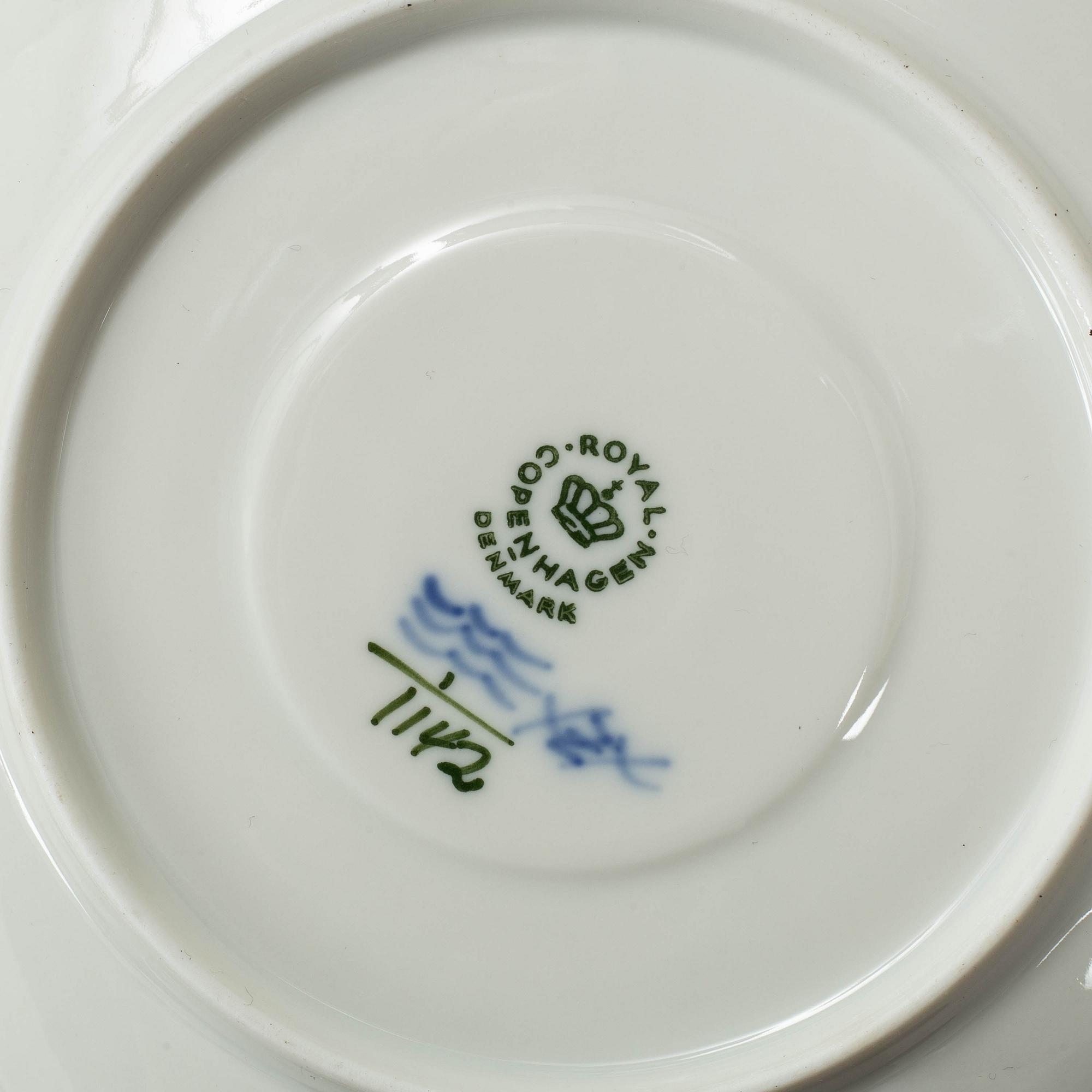 A set of six Danish Royal Copenhagen "Blu fluted full lace" pordelain teacups and saucers model 1142.