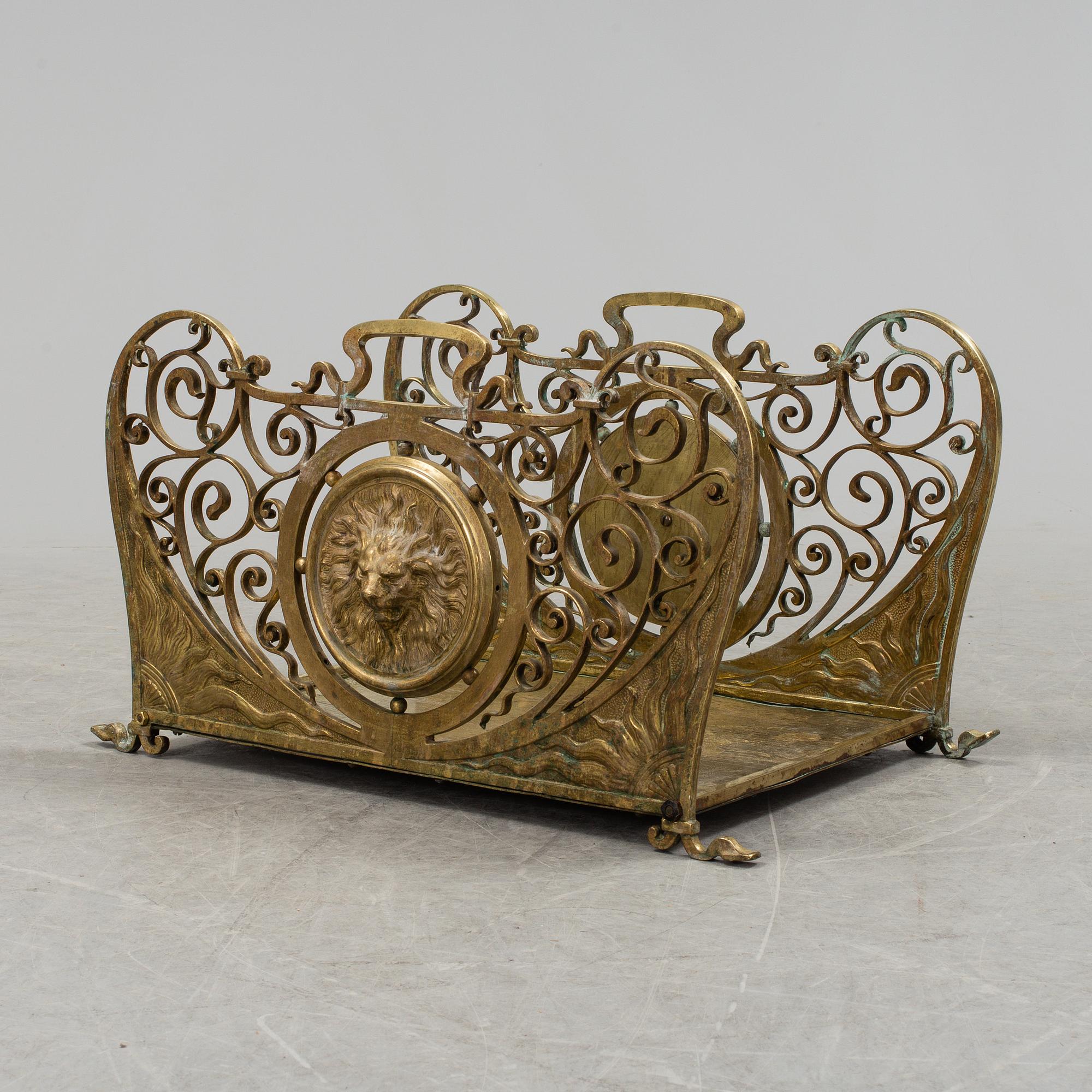 A French late 19th century brass firewood rack / fireplace log holder.