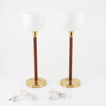 A matched pair of model E 1251 table lamps from ASEA, mid 20th Century.