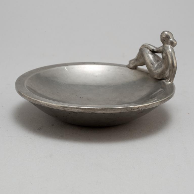 a pewter plate by Firma Svenskt Tenn Stockholm, 1928.