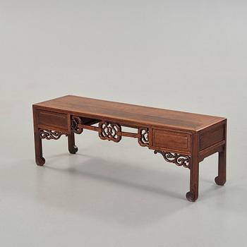 A Chinese hardwood low table, early 20th Century.