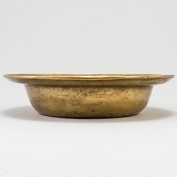 A 17th century bronze bowl.